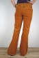 Preview: Schlaghose "Zimmermann" Cord flare in orange von hinten mit angeschrägter Hüfte