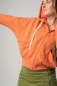 Mobile Preview: Sweatjacke "Meike" Orange mit Kapuze Detailansicht von vorne