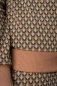 Mobile Preview: Stehkragen Pullover Damen Art Deco Muster Beige Detailansicht Bündchen